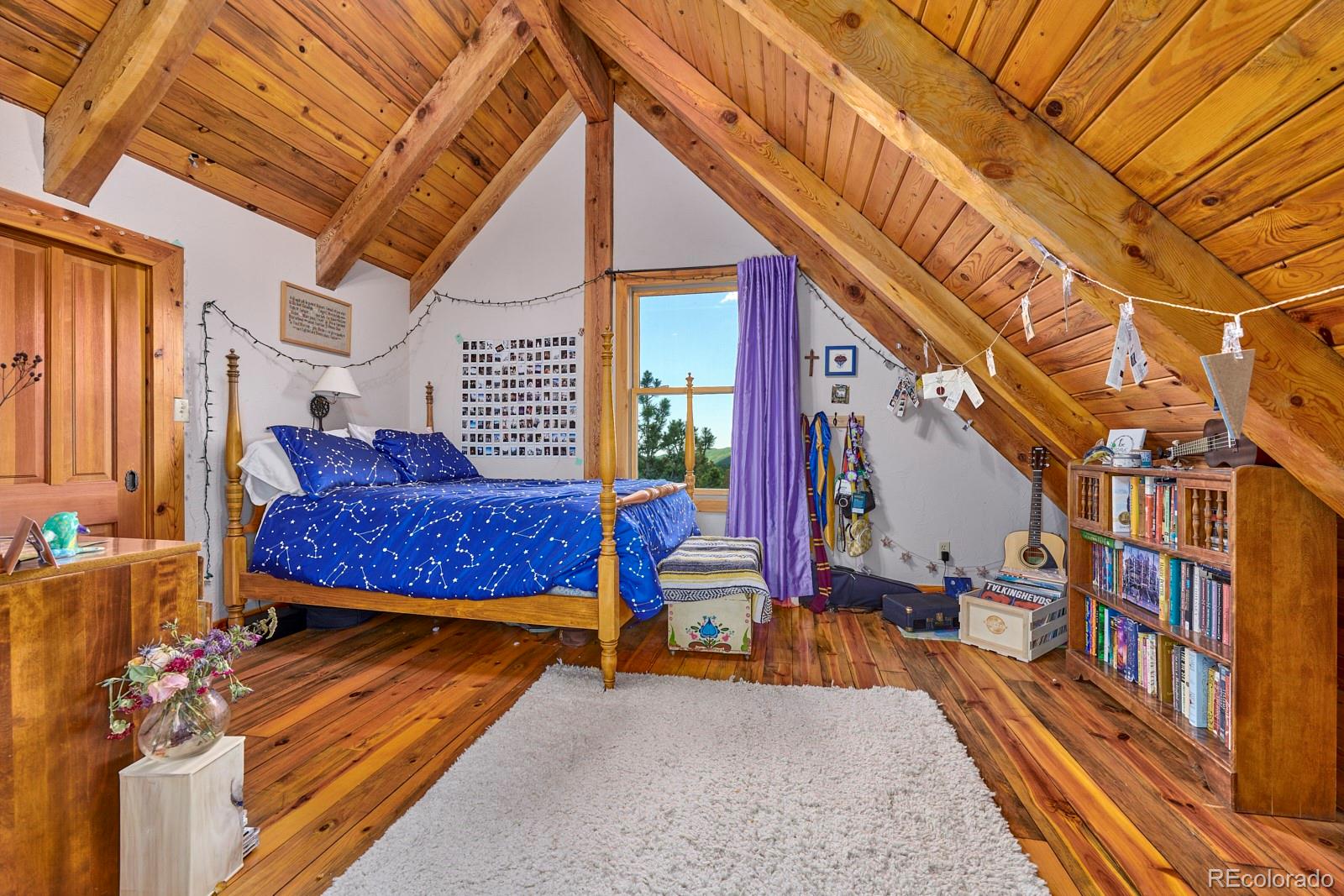 2847 Ridge Road Nederland, CO 80466 - Photo 26 of 40 a view of a chairs setting on the roof deck