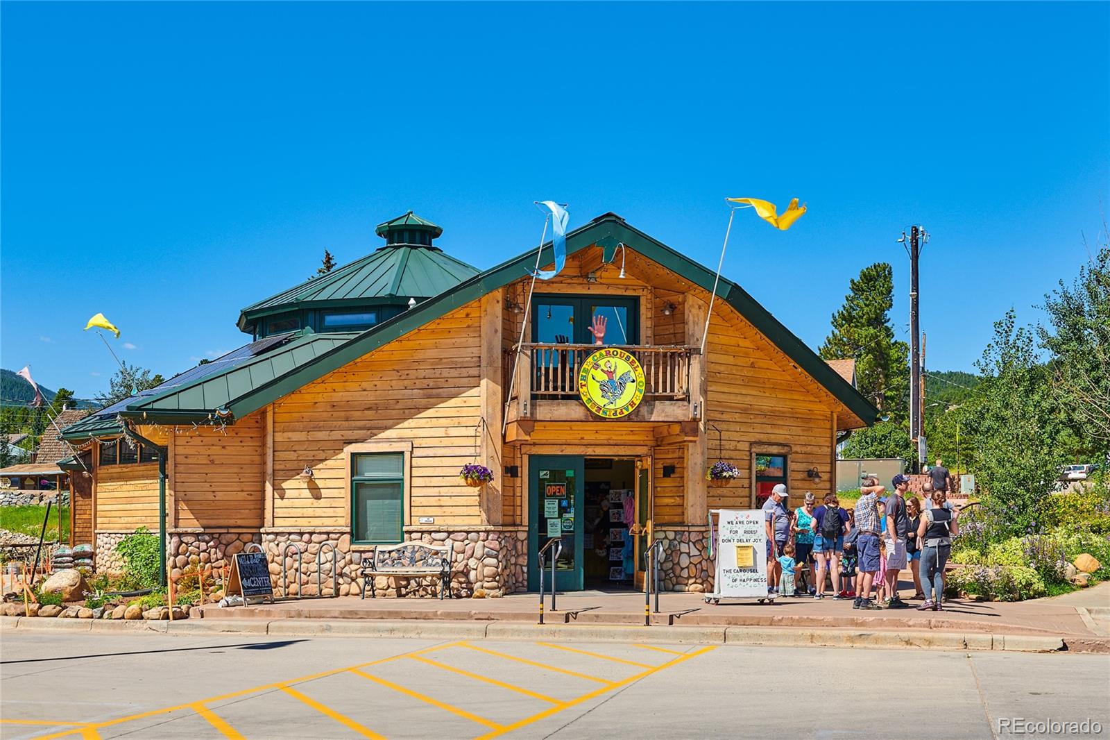2847 Ridge Road Nederland, CO 80466 - Photo 38 of 40 a view of a street with a building and a people in a patio