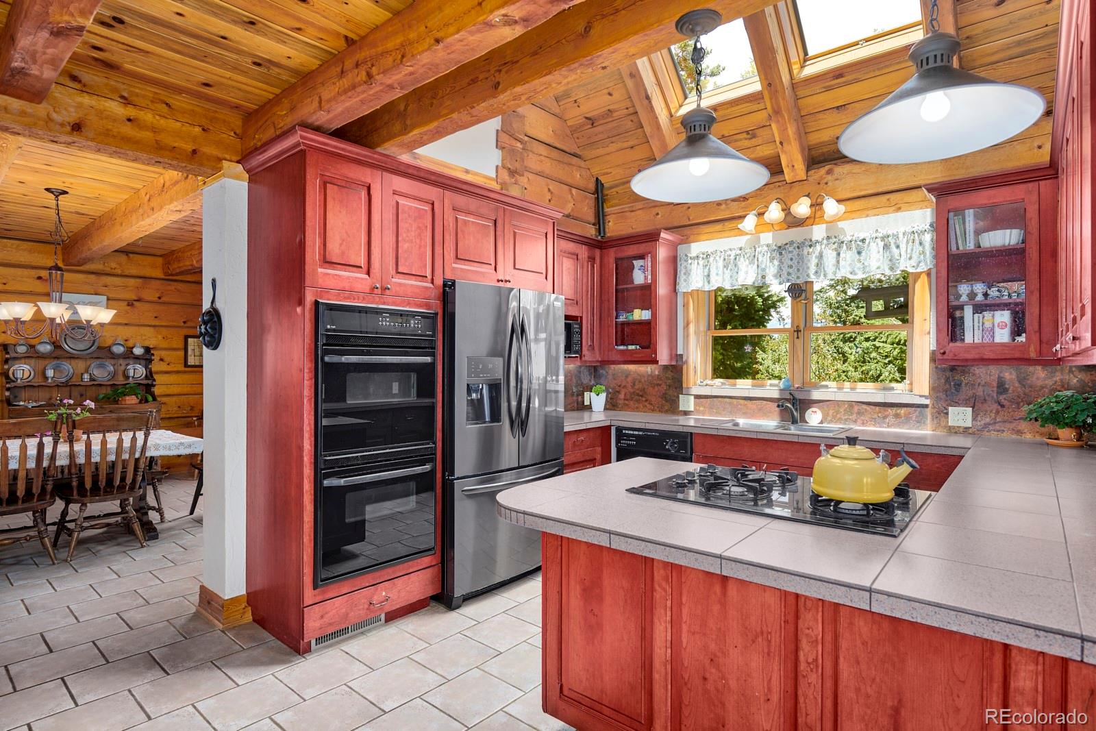 2847 Ridge Road Nederland, CO 80466 - Photo 10 of 40 a view of a living room and outdoor space
