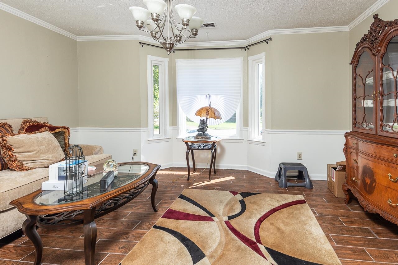 7829 Gateway Inlet Memphis, TN 38119 - Photo 12 of 30 a work room with furniture and a chandelier