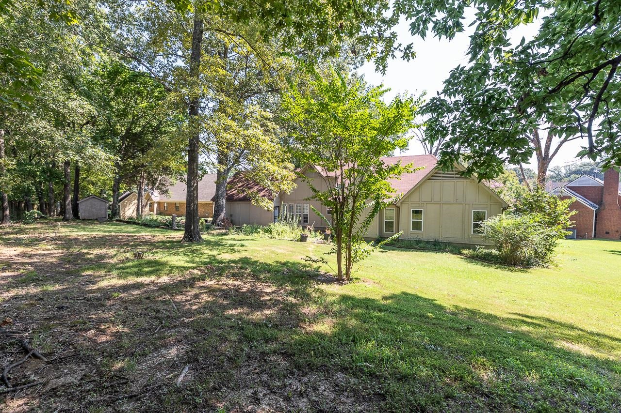 7829 Gateway Inlet Memphis, TN 38119 - Photo 25 of 30 a view of a house with a yard