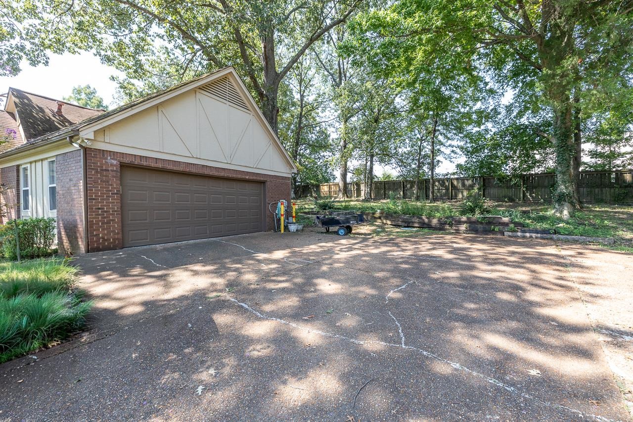 7829 Gateway Inlet Memphis, TN 38119 - Photo 29 of 30 a view of backyard of house with green space