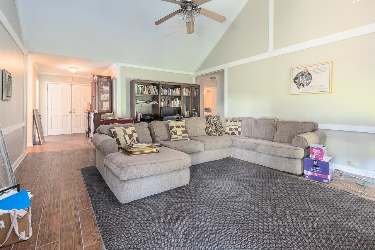 7829 Gateway Inlet Memphis, TN 38119 - Photo 8 of 30 a living room with furniture and a large window