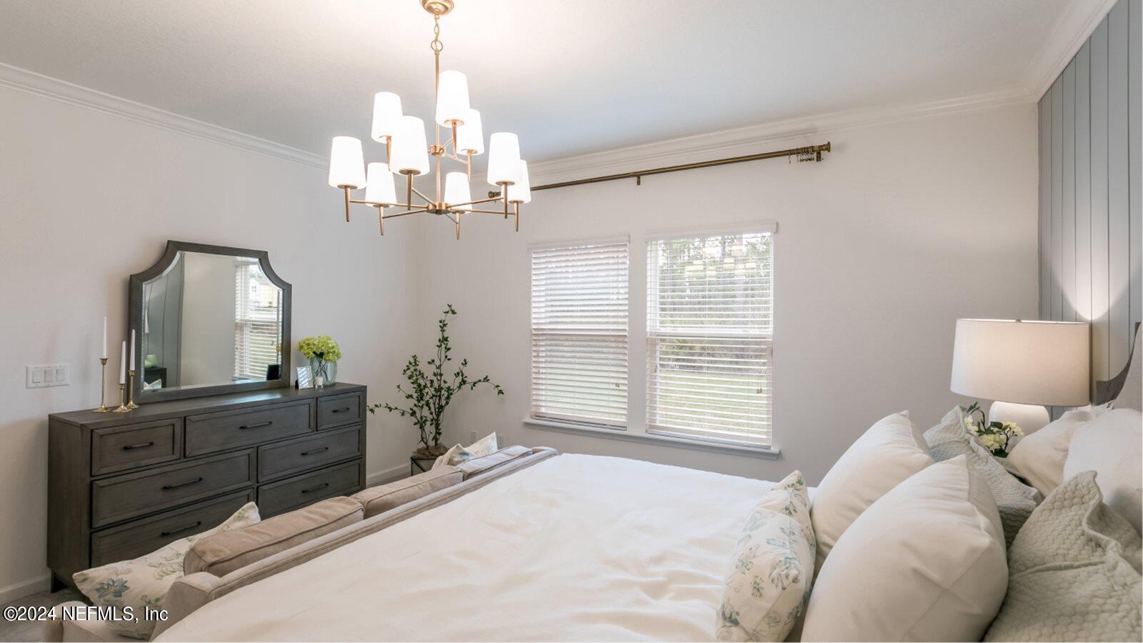 59 Bevins Lane St. Augustine, FL 32092 - Photo 13 of 14 a bedroom with a large bed and a window