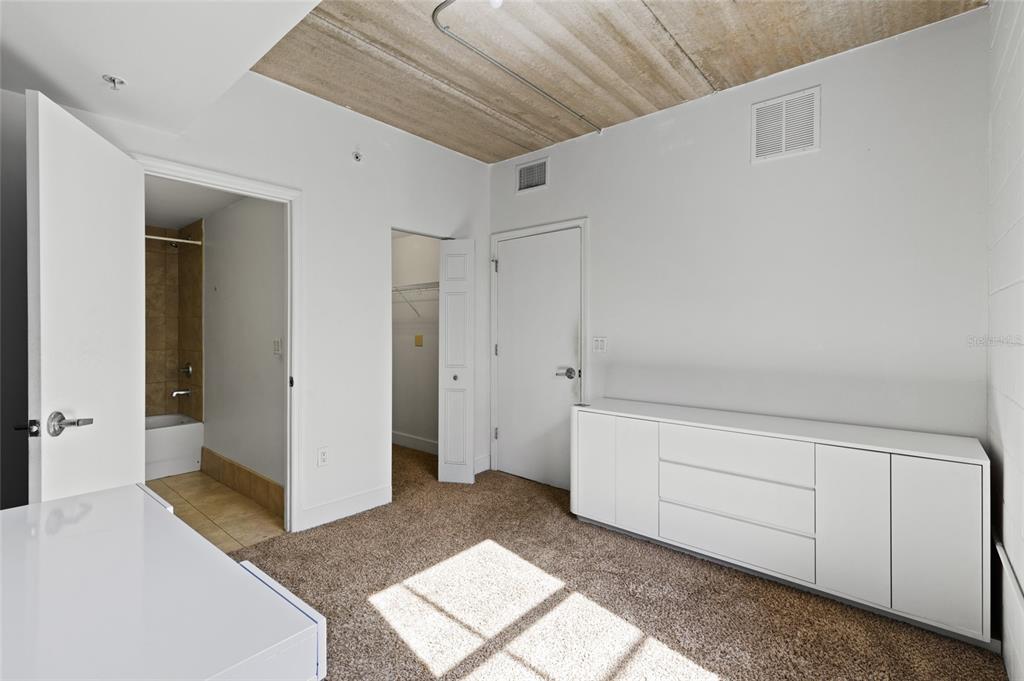 2515 Southwest 35th Place, Unit 203 Gainesville, FL 32608 - Photo 20 of 22 a view of a room with an empty space