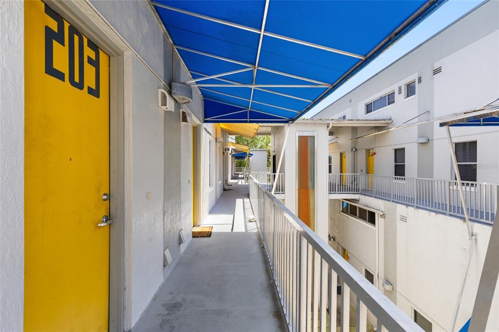 2515 Southwest 35th Place, Unit 203 Gainesville, FL 32608 - Photo 5 of 22 a view of a porch