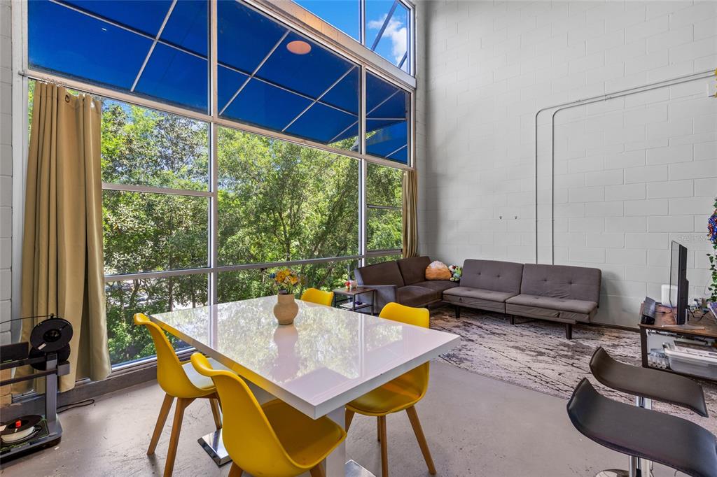 2515 Southwest 35th Place, Unit 203 Gainesville, FL 32608 - Photo 7 of 22 a living room with furniture and a window