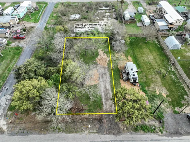 an aerial view of residential house with outdoor space