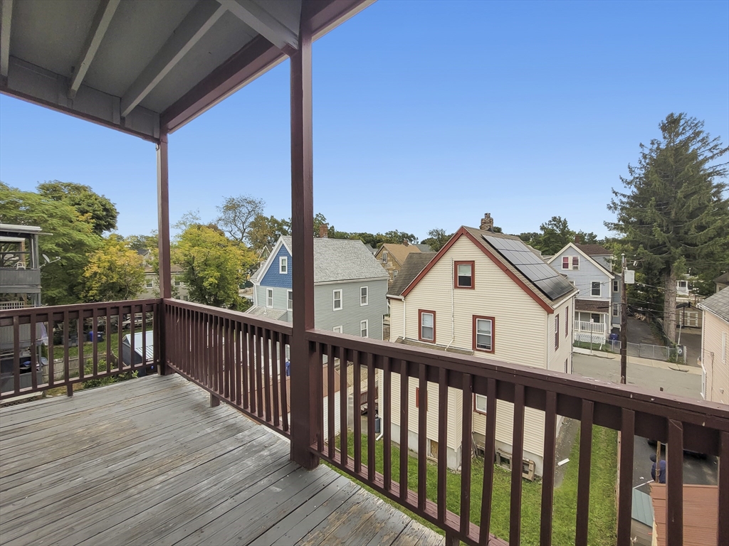 108 Callender Street, Unit 3 Boston, MA 02124 - Photo 12 of 12 a view of a houses with a balcony
