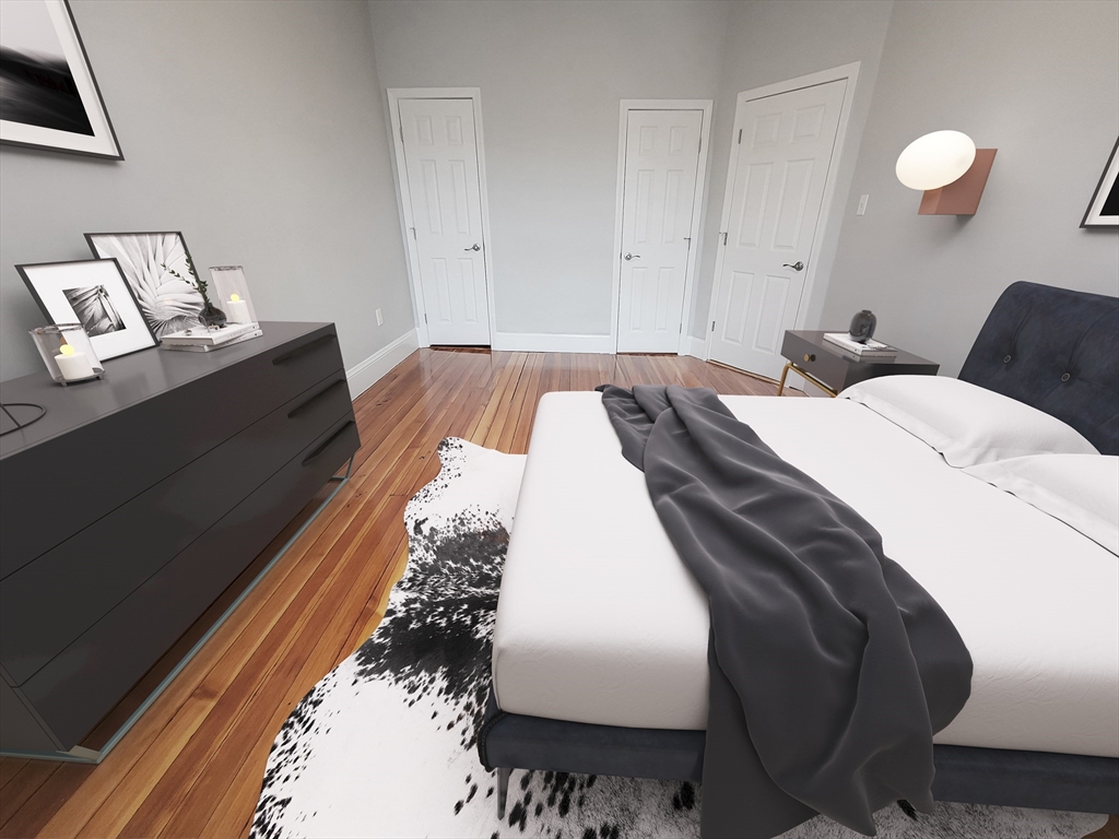 108 Callender Street, Unit 3 Boston, MA 02124 - Photo 7 of 12 a bed room with a bed