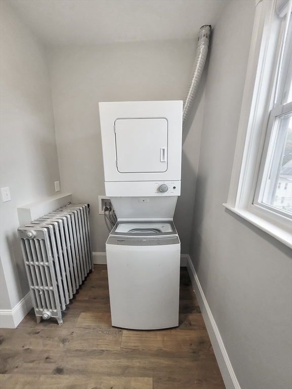 108 Callender Street, Unit 3 Boston, MA 02124 - Photo 9 of 12 a utility room with dryer and washer