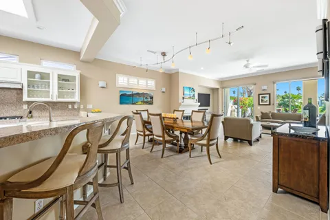 a room with lots of chairs and mirrors