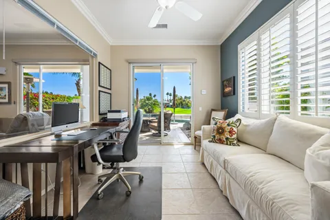 a view of a livingroom with furniture and a window