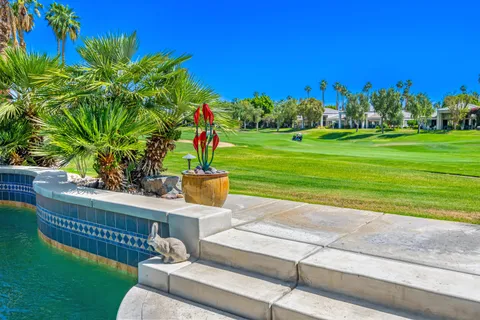 a view of a bench in a garden