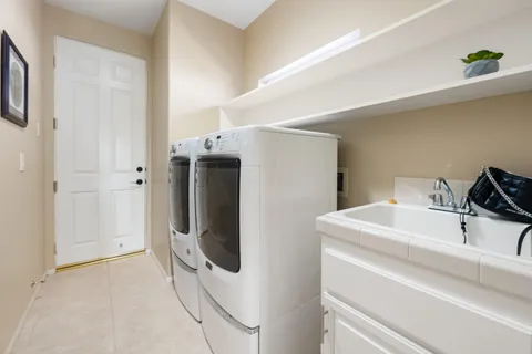 a bathroom with a sink and mirror