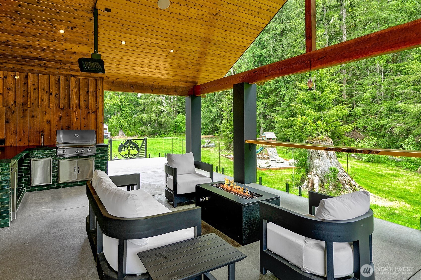 7538 Moon Valley Road Southeast North Bend, WA 98045 - Photo 8 of 40 a building outdoor space with patio furniture