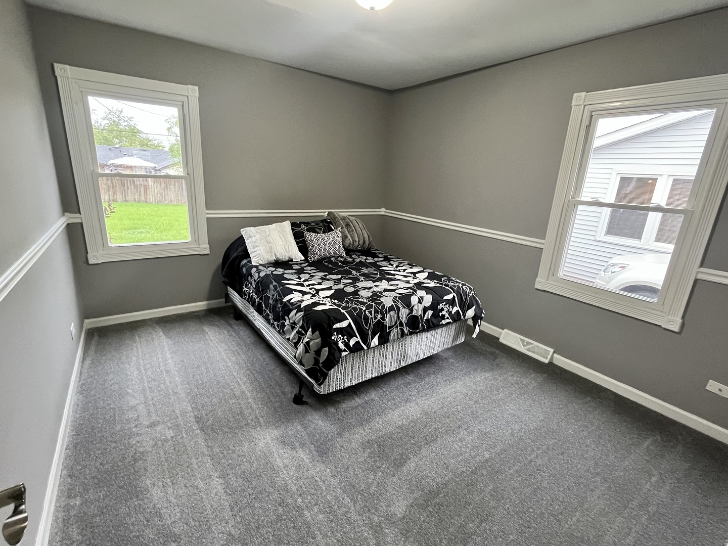 207 MacGregor Road Lockport, IL 60441 - Photo 8 of 14 a bed sitting in a bedroom next to a window