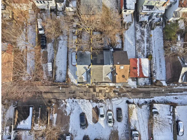 a view of street with tall trees