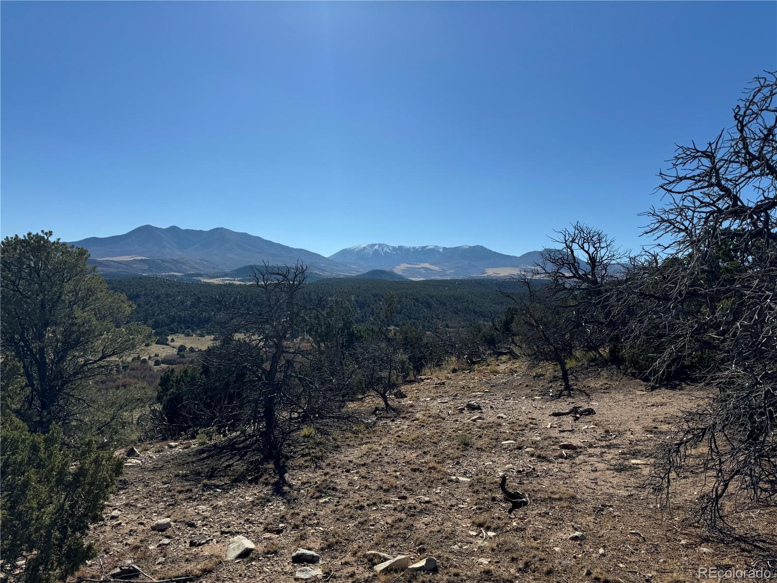 L41 Co Road, Unit BB Gardner, CO 81040 - Photo 13 of 22 a view of a dry yard with mountains in the background