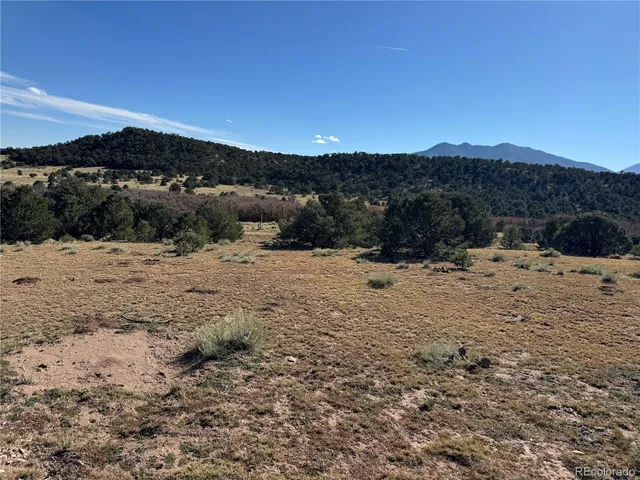 a view of a large mountain with a outdoor space