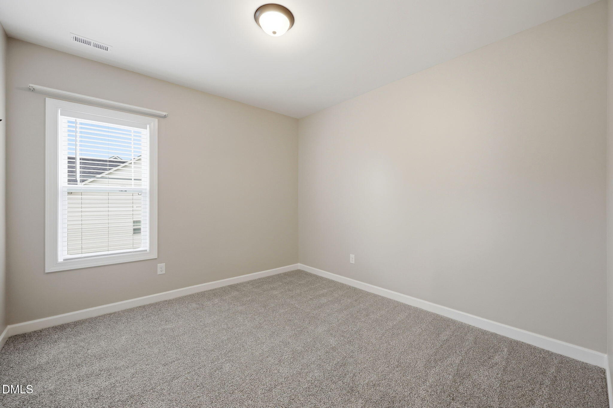 146 Seahawk Way Zebulon, NC 27597 - Photo 28 of 51 an empty room with a window