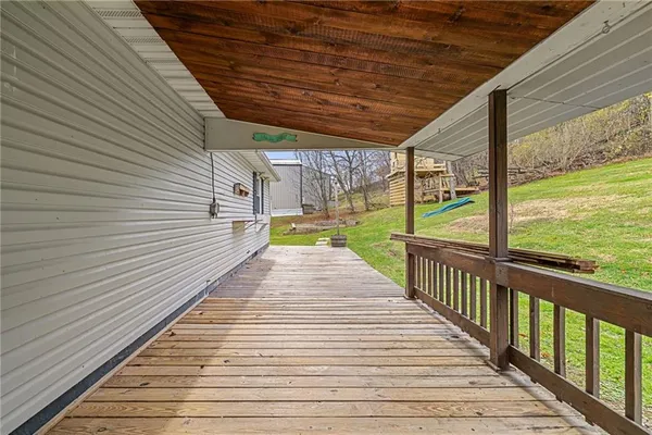 a backyard of a house with lots of green space