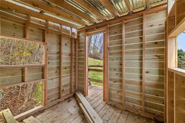 a aerial view of a house with a yard