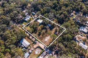 an outdoor space with seating and trees