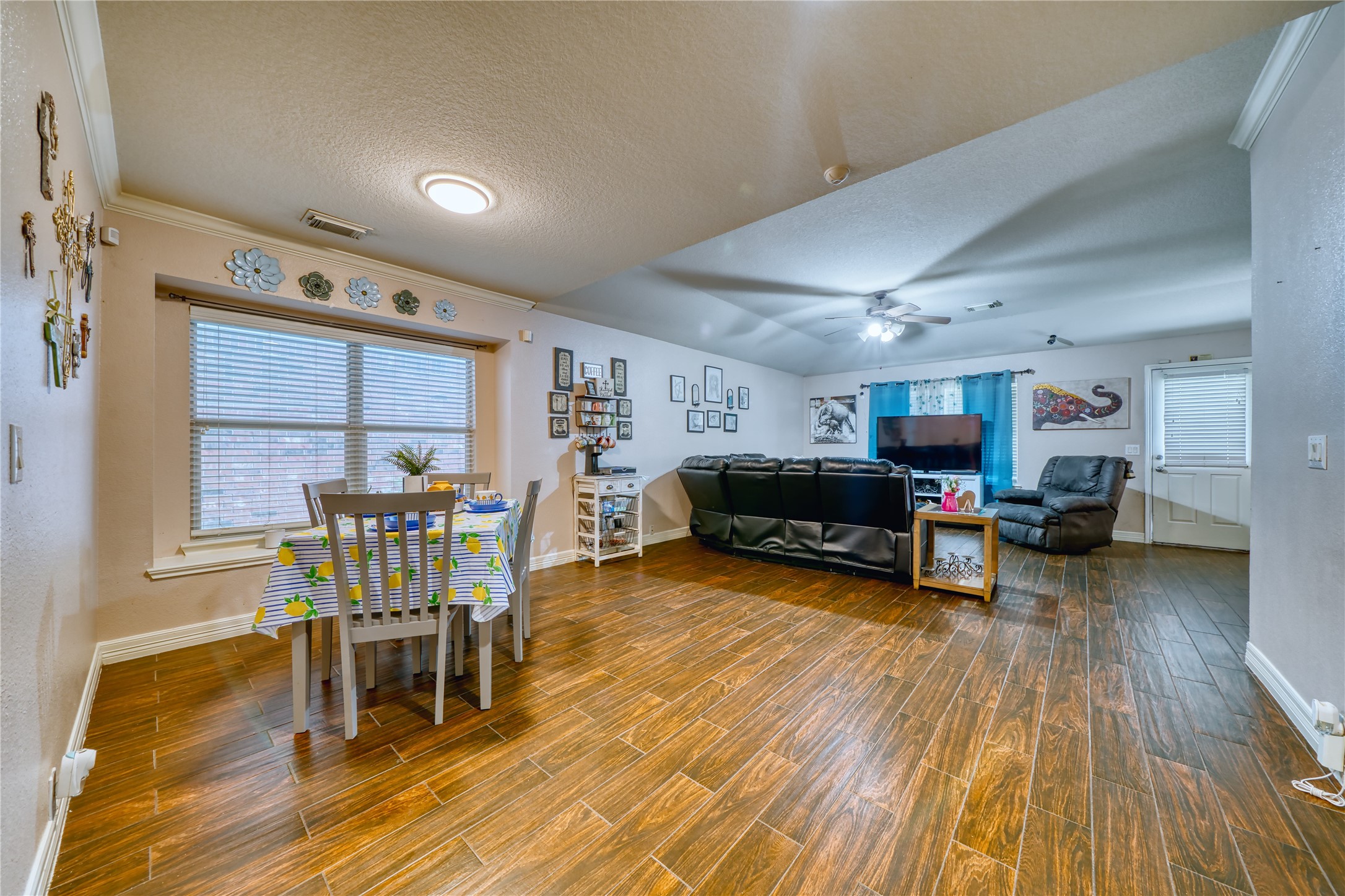 2210 Mountain Ranch Drive Houston, TX 77049 - Photo 13 of 36 a living room with furniture and a wooden floor