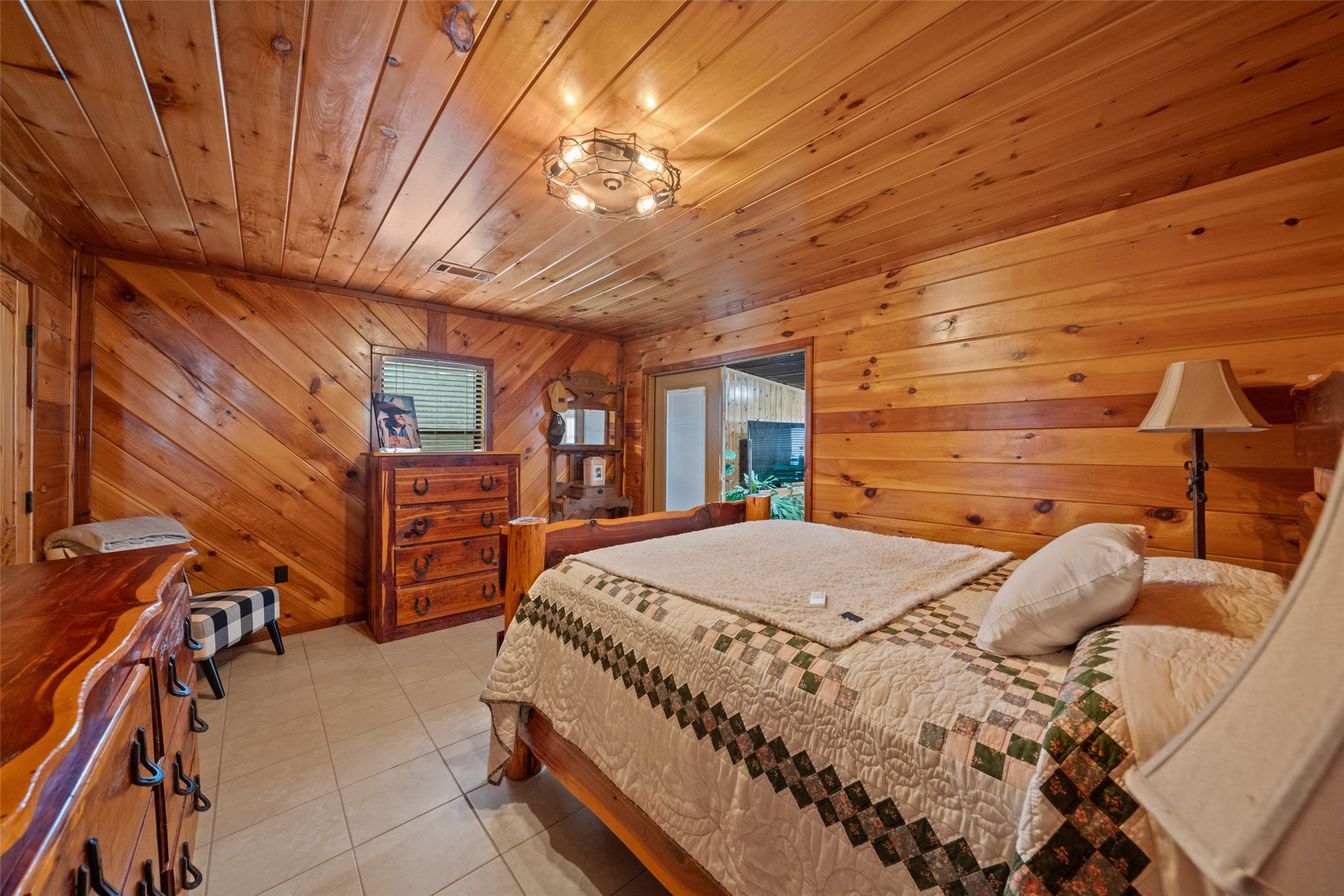 31 Shady Lane Shepherd, TX 77371 - Photo 13 of 31 a bed sitting in a spacious bedroom next to a larger window