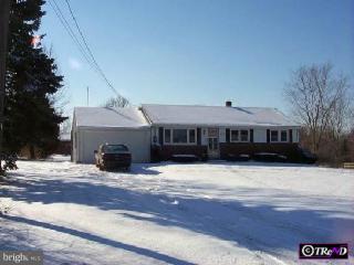 916 Callowhill Road Perkasie, PA 18944 - Photo 1 of 1 a front view of a house with a yard covered in snow