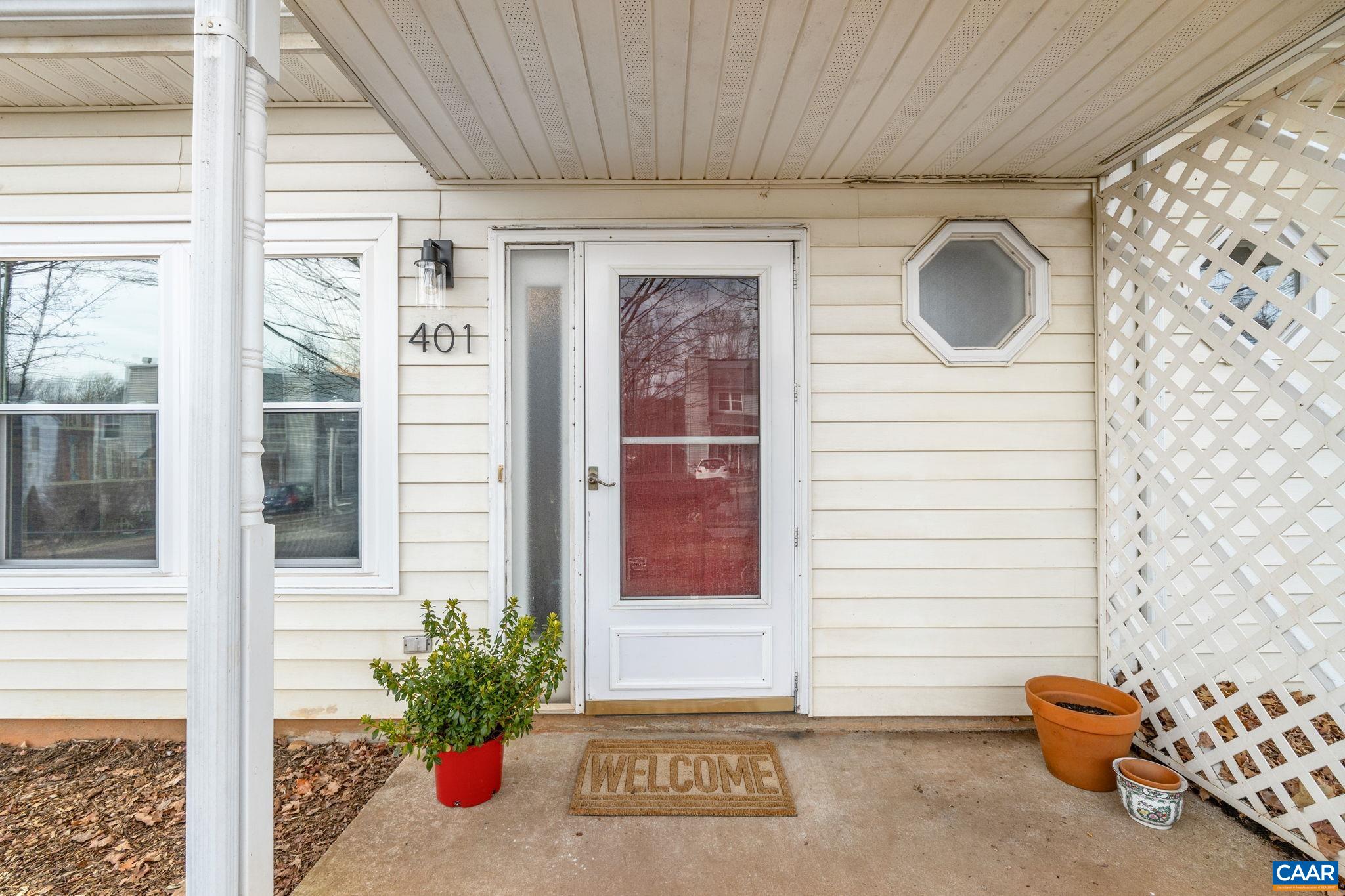 401 Riverside Avenue Charlottesville, VA 22902 - Photo 29 of 36 a potted plant sitting in front of a door