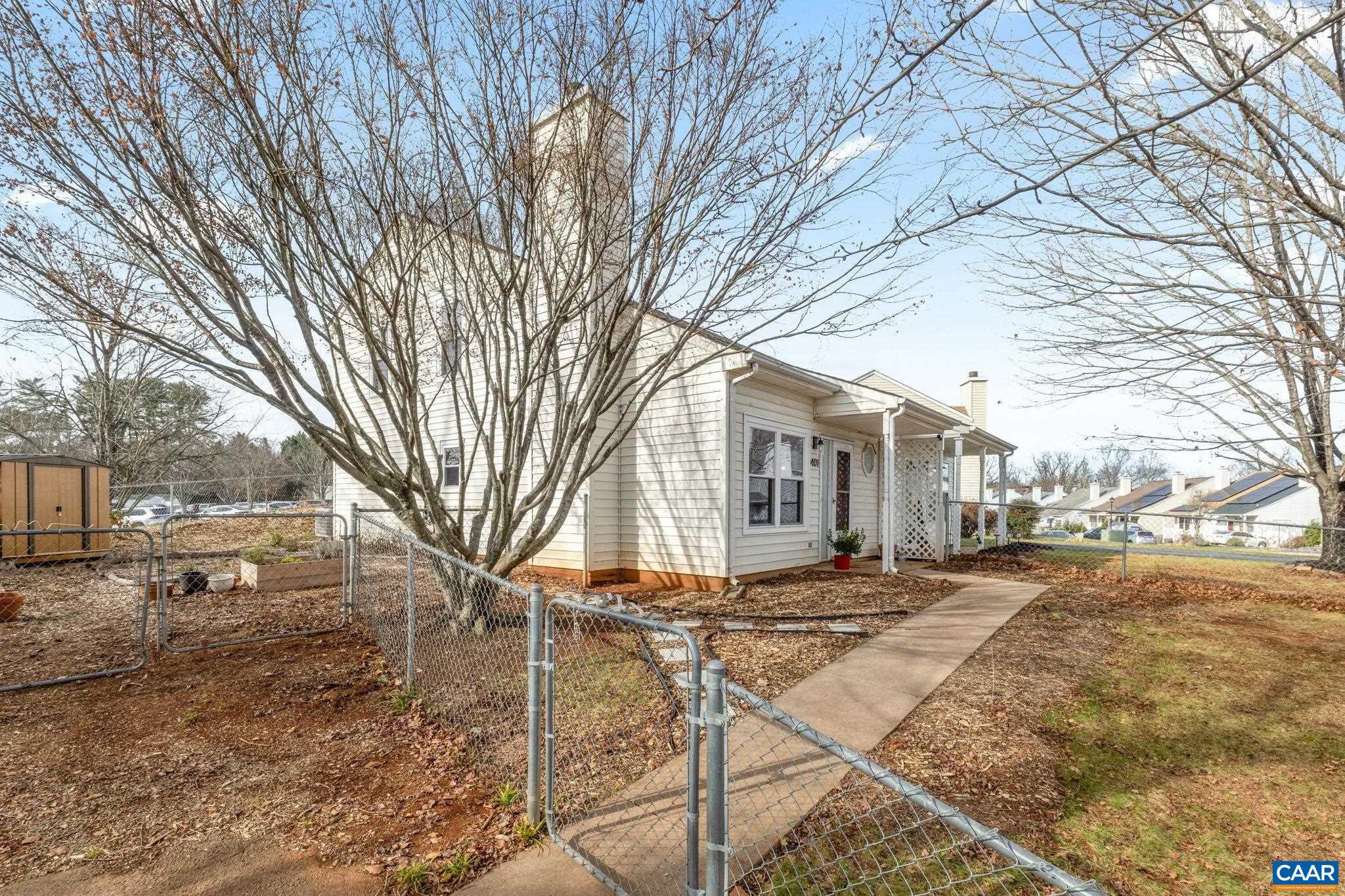401 Riverside Avenue Charlottesville, VA 22902 - Photo 36 of 36 a front view of a house with a yard covered in snow