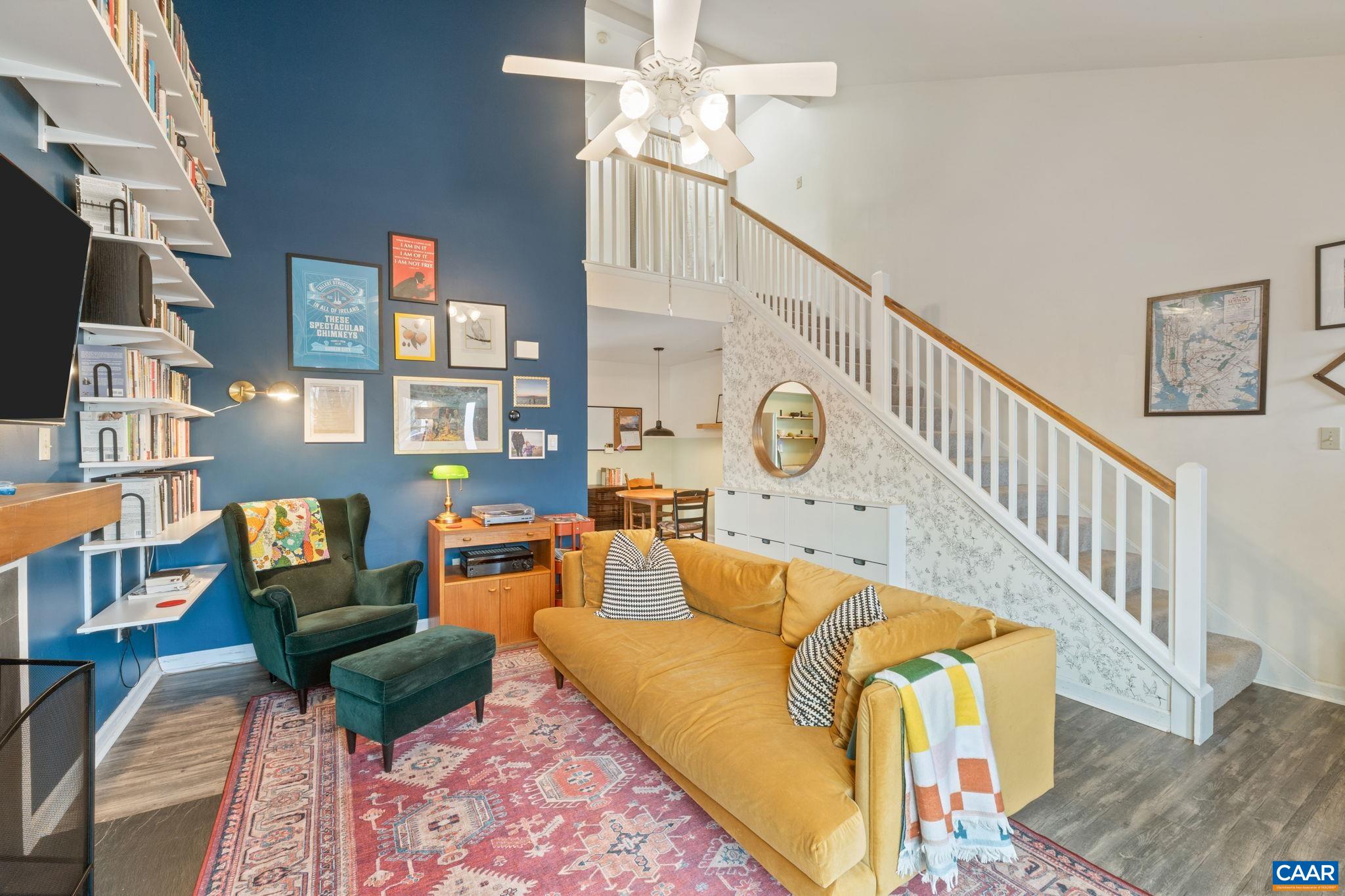 401 Riverside Avenue Charlottesville, VA 22902 - Photo 6 of 36 a living room with furniture and a fireplace