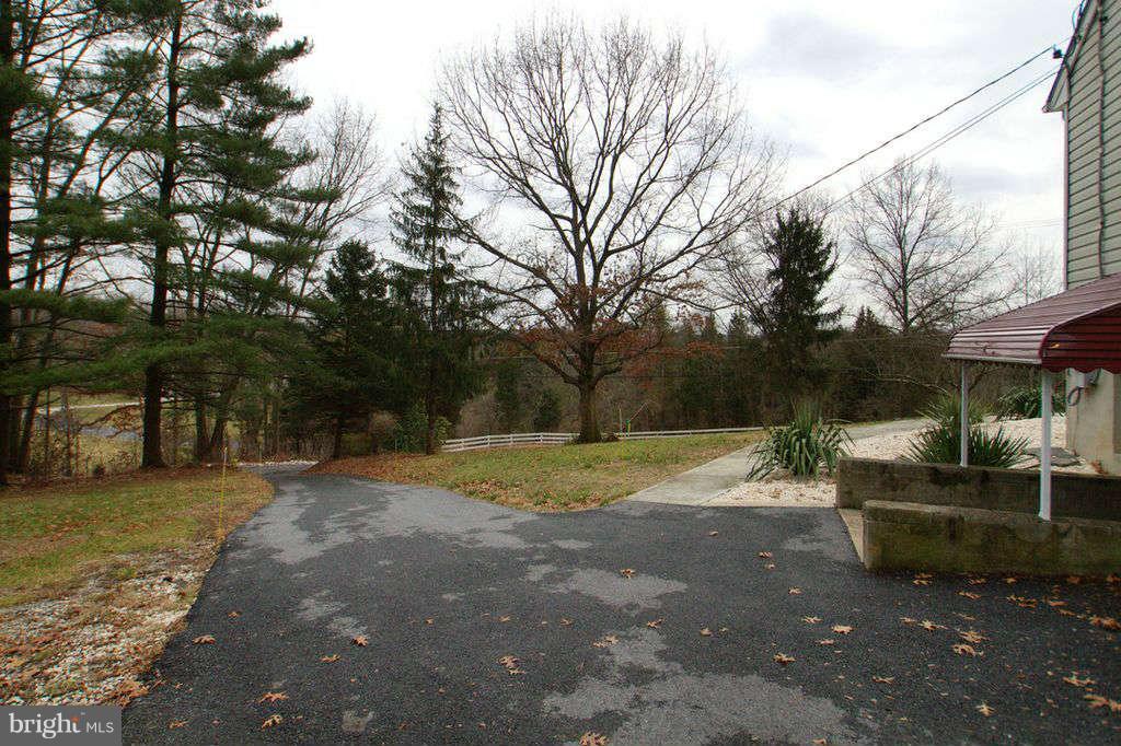 1010 Bernoudy Road White Hall, MD 21161 - Photo 27 of 28 a backyard of a house with barbeque oven