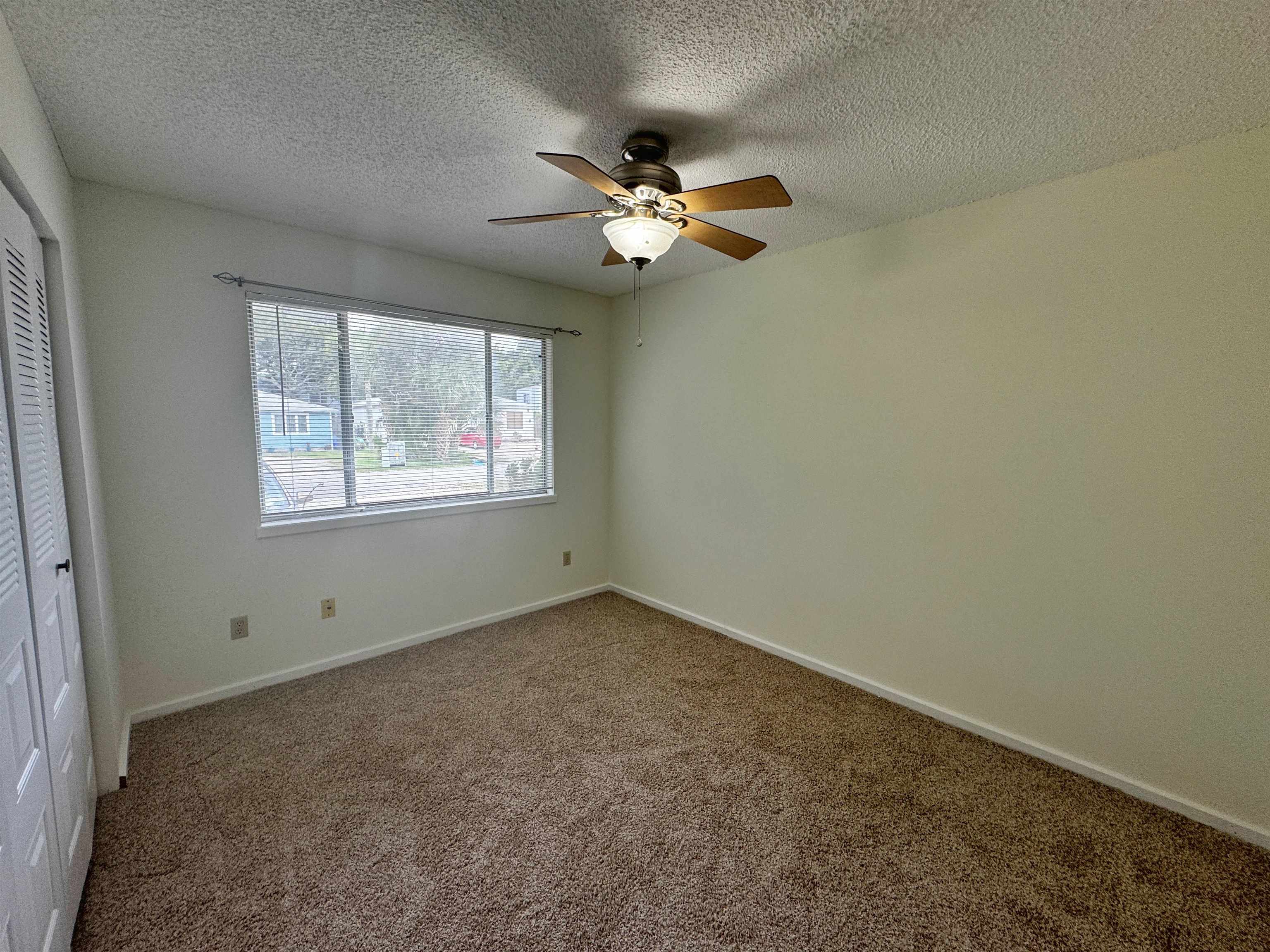 204 8th Street, Unit A St. Augustine, FL 32080 - Photo 8 of 15 an empty room with a window