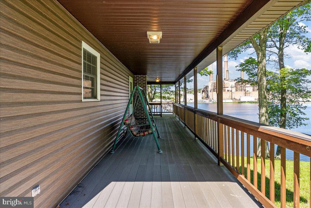 663 Bear Woods Road Mount Storm, WV 26739 - Photo 50 of 73 Serene lakeside porch retreat.