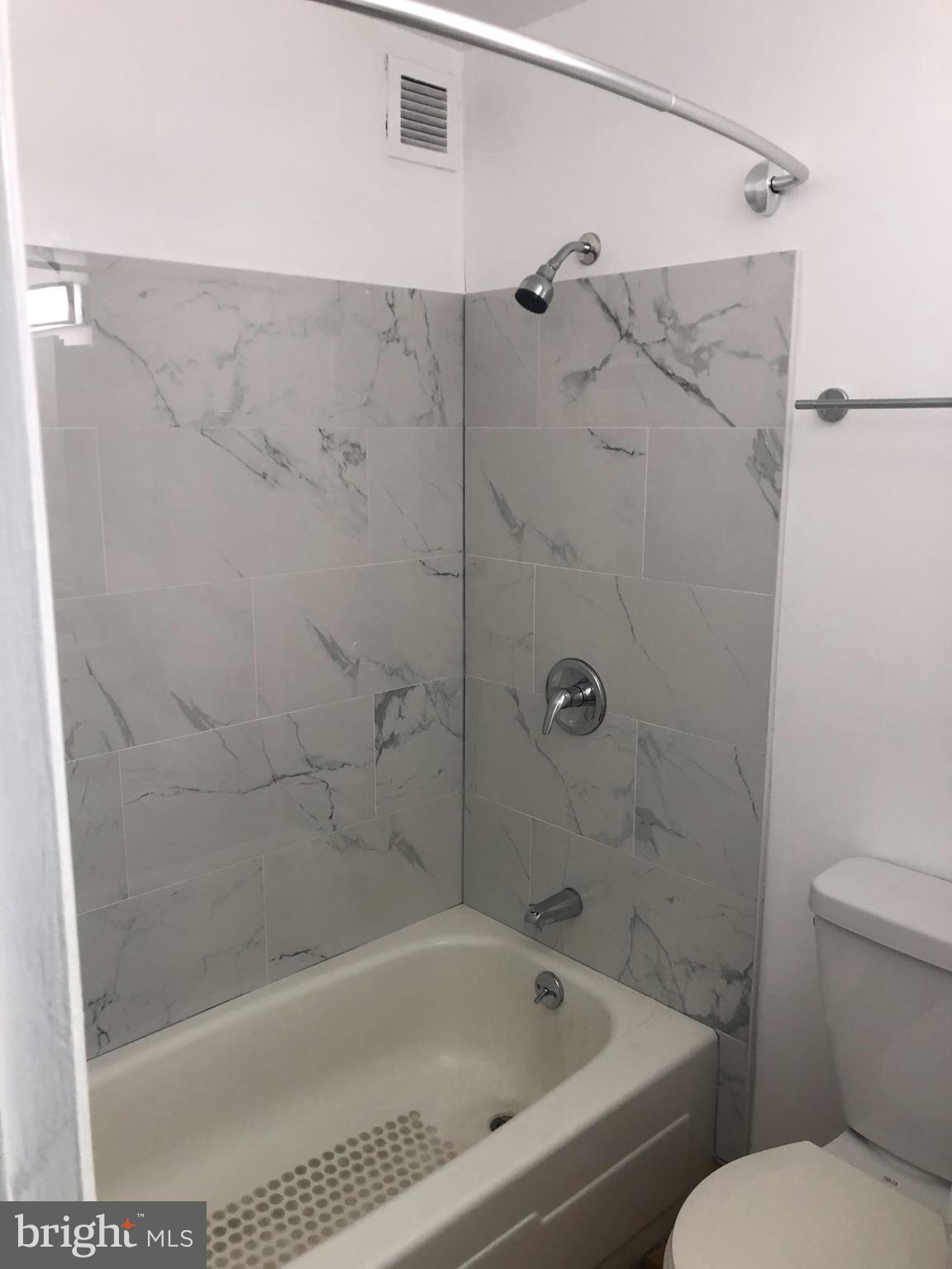 1615 Q Street Northwest, Unit 406 Washington, DC 20009 - Photo 4 of 21 Renovated Bathroom