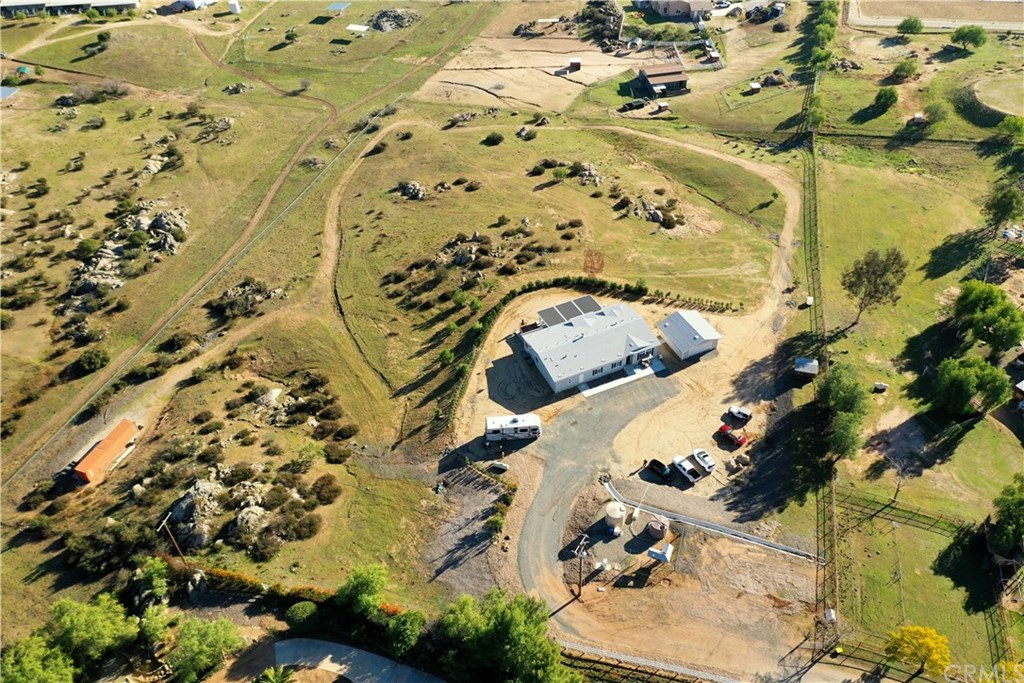 39423 Grassy Road Temecula, CA 92592 - Photo 1 of 39 Aerial view of home shows full fencing and storage container location. This picture was taken before the white vinyl fencing was added around the home.