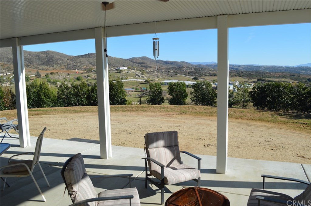 39423 Grassy Road Temecula, CA 92592 - Photo 23 of 39 backyard before white vinyl fencing installed