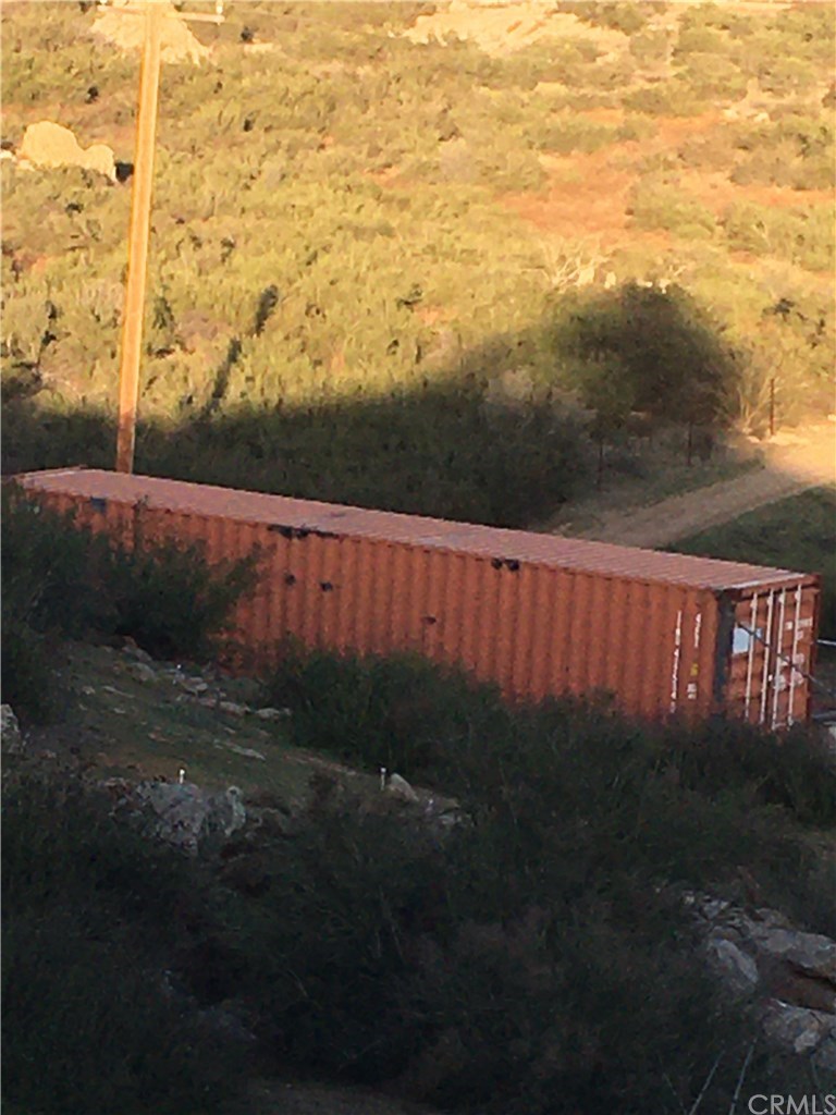 39423 Grassy Road Temecula, CA 92592 - Photo 38 of 39 Storage container with shelving included!