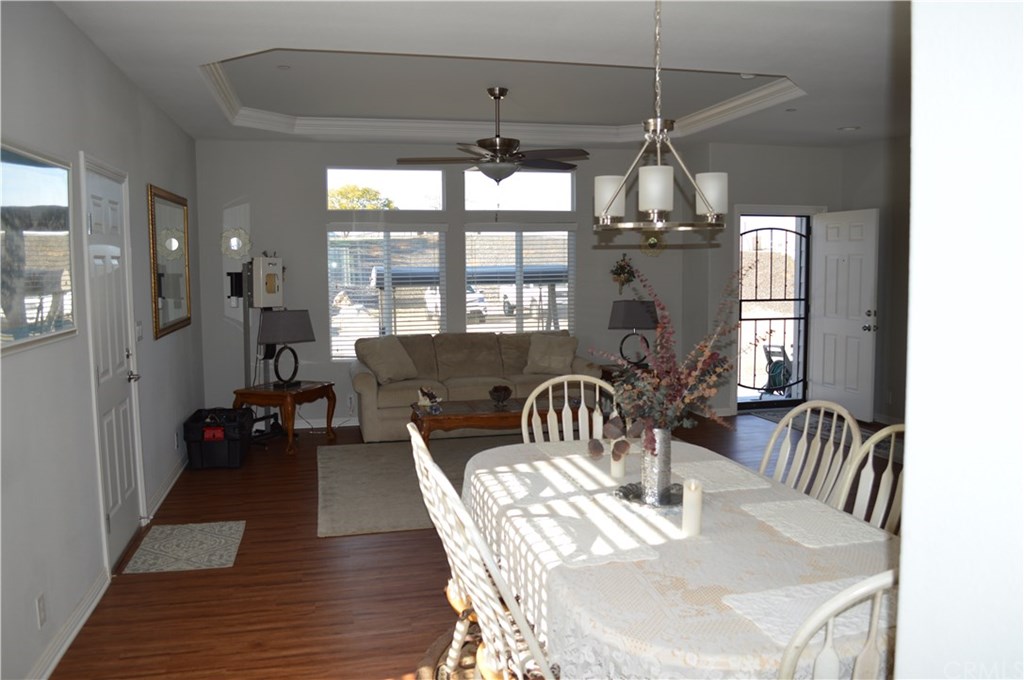 39423 Grassy Road Temecula, CA 92592 - Photo 8 of 39 Living room and dining room area with coffered ceiiling