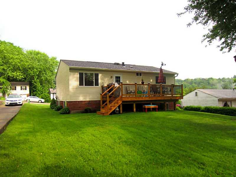 1357 Cavitt Road Monroeville, PA 15146 - Photo 12 of 25 Exterior Back. The Yard is Level which makes it Perfect for all of your Outdoor Activities.
