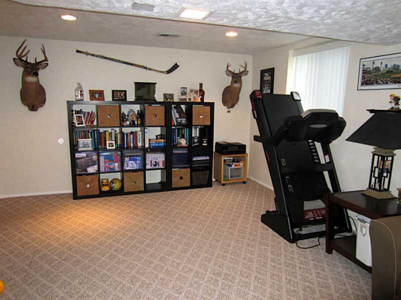 1357 Cavitt Road Monroeville, PA 15146 - Photo 20 of 25 Den/Family/Great Room. The Lower Level Family Room boasts Recessed Lighting, a Finished Ceiling, and 2 Windows
