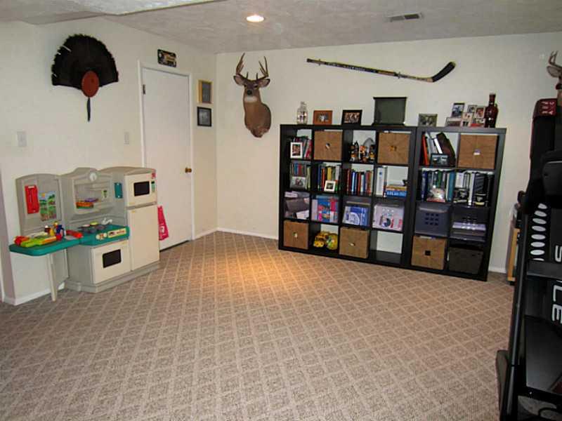 1357 Cavitt Road Monroeville, PA 15146 - Photo 21 of 25 Den/Family/Great Room. It is the Perfect Room for Entertaining, or Watching the Big Game.