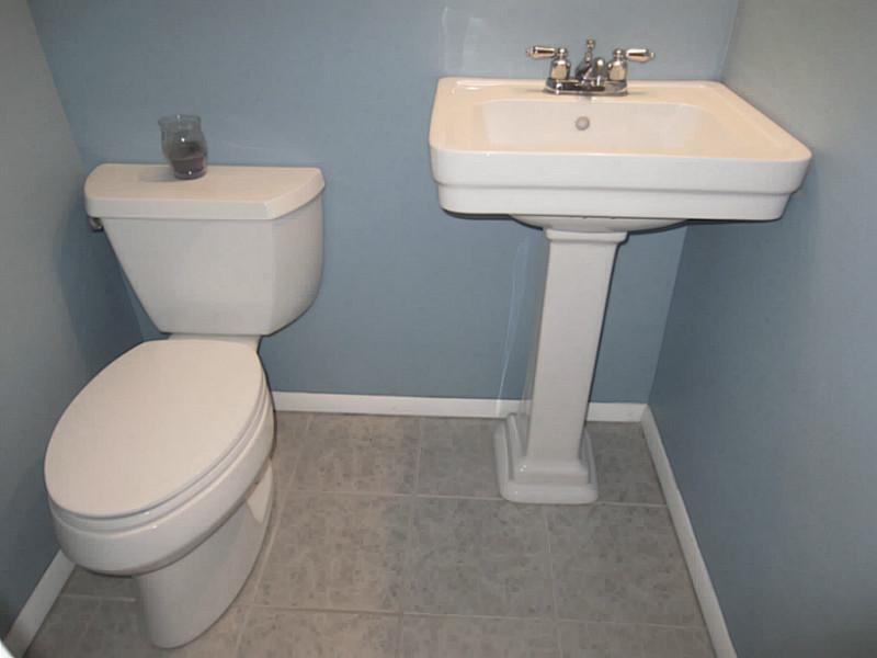 1357 Cavitt Road Monroeville, PA 15146 - Photo 23 of 25 Partial Bath. The Partial Bath near the Family Room adds convenience. Notice the Updated Ceramic Flooring.