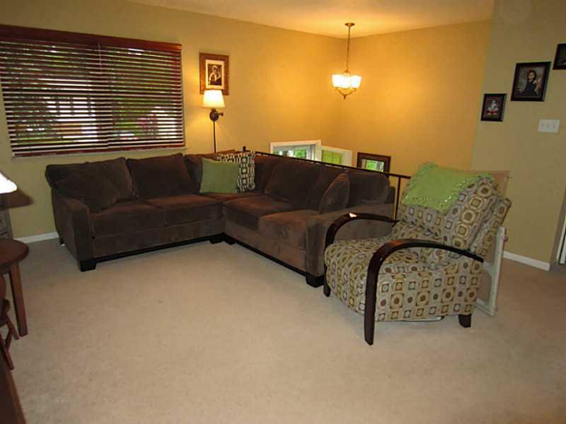 1357 Cavitt Road Monroeville, PA 15146 - Photo 4 of 25 Living Room. The Living Room Features a Large Window that fills the Living room with Natural Light.