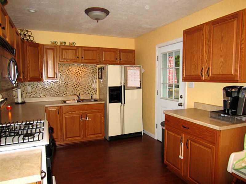 1357 Cavitt Road Monroeville, PA 15146 - Photo 8 of 25 Kitchen. The Gas Stove, Dishwasher, Refrigerator, Microwave and Disposal are all Included with the Home.