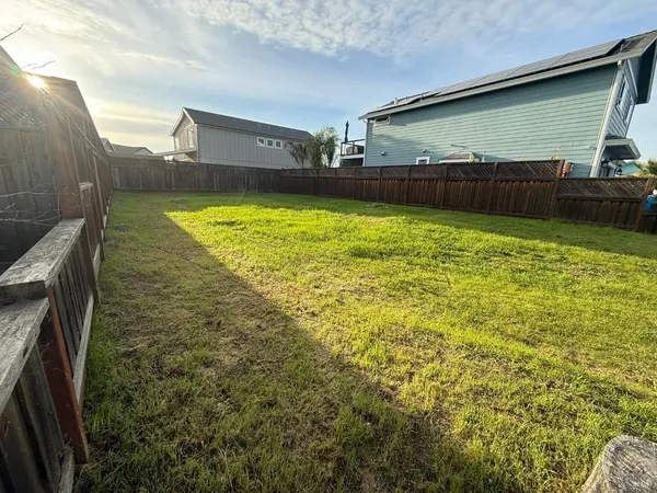 a bathroom with a sink and a large window