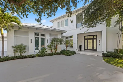 front view of a house with a small yard